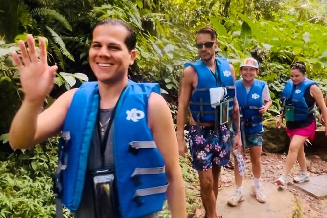 2 Tours in 1 Day: Rainforest Waterslides & Beach Tour w/Transport - Sliding through the rainforest river