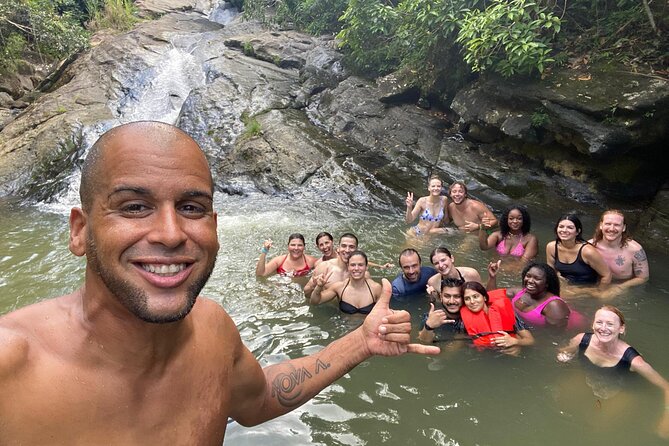 El Yunque & Beach Tour: Waterslide, Waterfall, Food, & Photos - Reaching the river after a five-minute hike