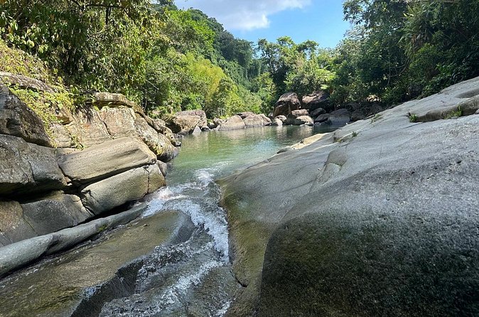 El Yunque & Beach Tour: Waterslide, Waterfall, Food, & Photos - Food and Luquillo Beach after the forest
