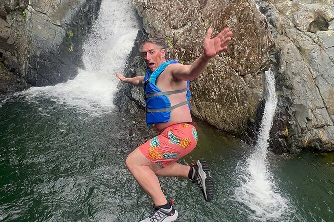 El Yunque Exclusive Experience: Waterslide Adventures w/Transport - Walking through the forest to the river