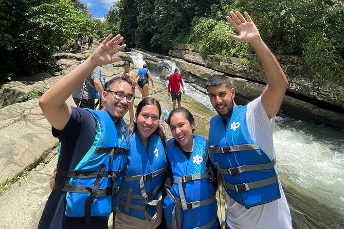 El Yunque Rainforest River and Beach Adventure Tour - Swimming, sliding, and jumping in the river