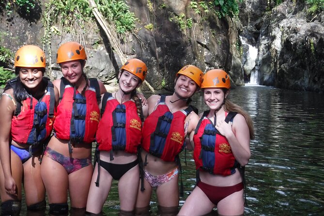 El Yunque Rainforest Tour: Natural Waterslides Adventure - Waterfalls, rock slides, and swimming holes