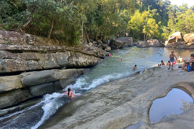El Yunque Rainforest- Water Slide, Luquillo Beach Guided Tour - Las Pailas and the slippery rock slide
