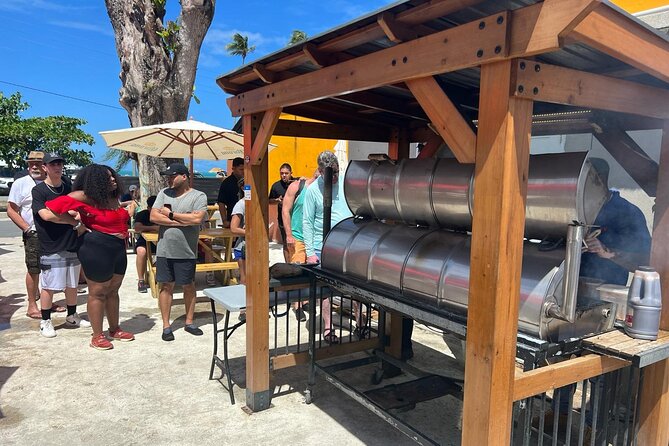 El Yunque Rainforest Waterslides and Luquillo Beach w/ Transport - Sliding, swimming, and jumping at Las Paylas