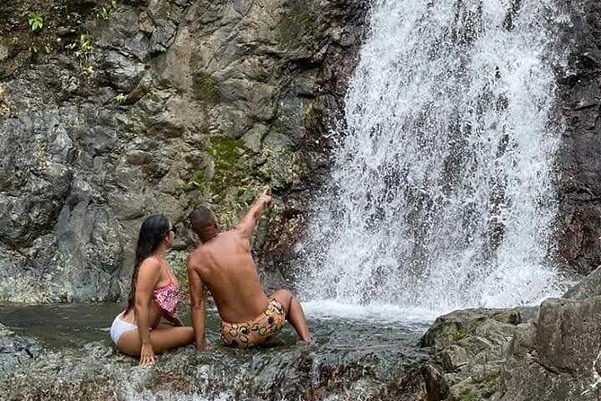El Yunque Tour with Luquillo Lunch Stop and Transport: 6 ppl Max - Working through the rainforest to Las Tinajas Falls