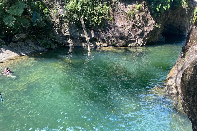 Full-Day Tinajas Hiking to El Yunque Rainforest with Transport - Tinajas waterfalls, clear pools, and spring water