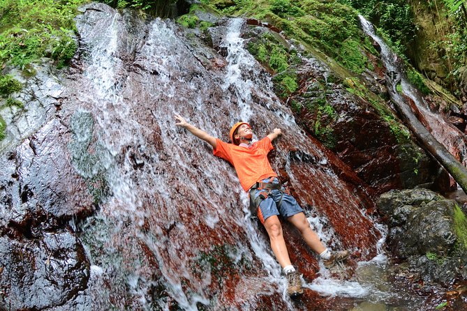 Full-Day Zipline and Waterfall Rappelling Adventure Near San Juan - Hiking Up El Salto Waterfall