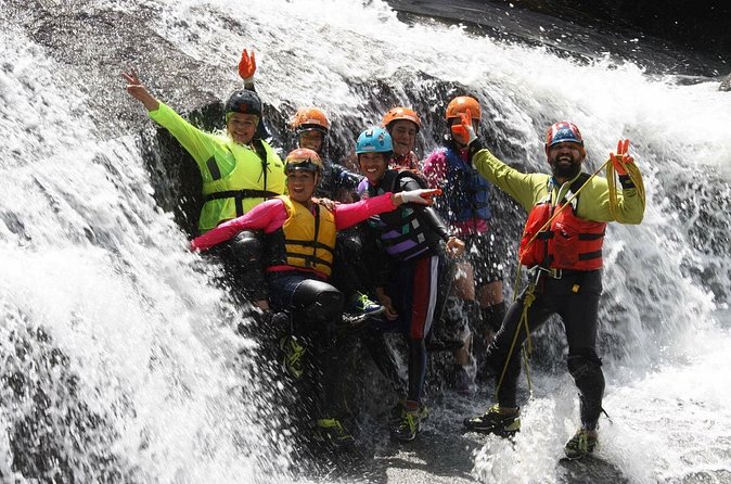 Half-Day El Yunque Rainforest Wilderness Adventure - Hiking through the river country