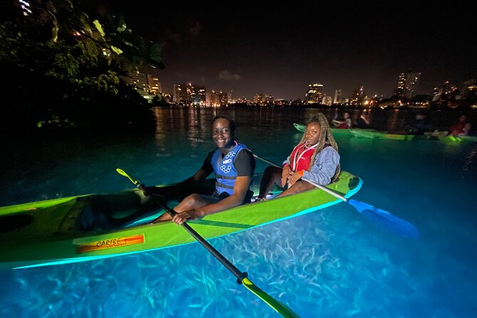 Night Kayak - Condado City Lights Tour - Looking through the clear kayak floor