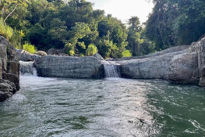Pinones Bar Hopping Beach Food Tour & Caguas River Hidden Gem - A boardwalk with Atlantic views