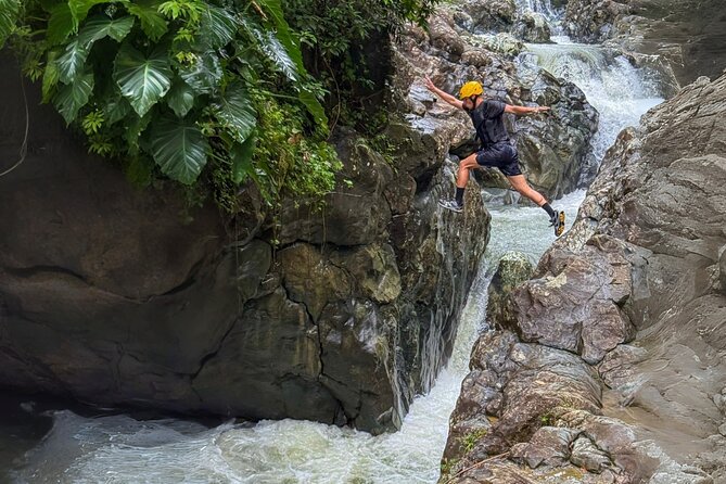 Private El Yunque Half-Day Tour with Transport - Hiking the muddy El Yunque trails