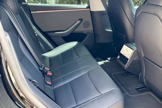 Puerto Rico Island Wide Private Transfers, Tesla 3 Luxury Sedan. - A calm start after San Juan Airport