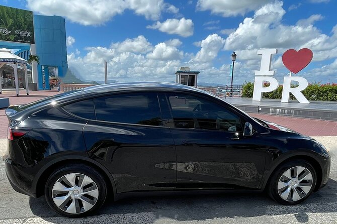Puerto Rico Island Wide Transfer, Tesla Y Luxury SUV, Select Zone - A private ride from baggage claim to your door