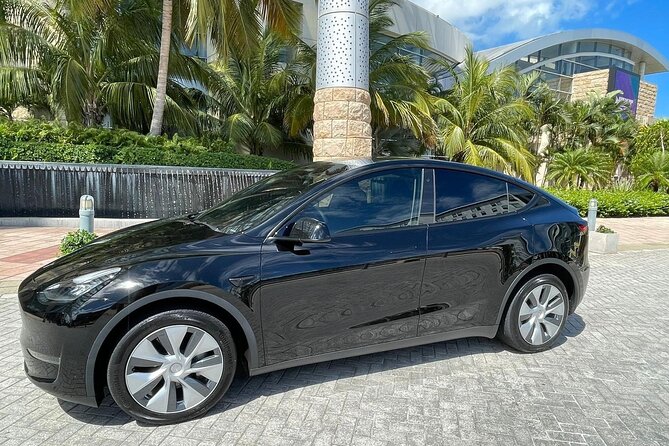 Puerto Rico Island Wide Transfer, Tesla Y Luxury SUV, Select Zone - Early flights, cruise arrivals, and family travel