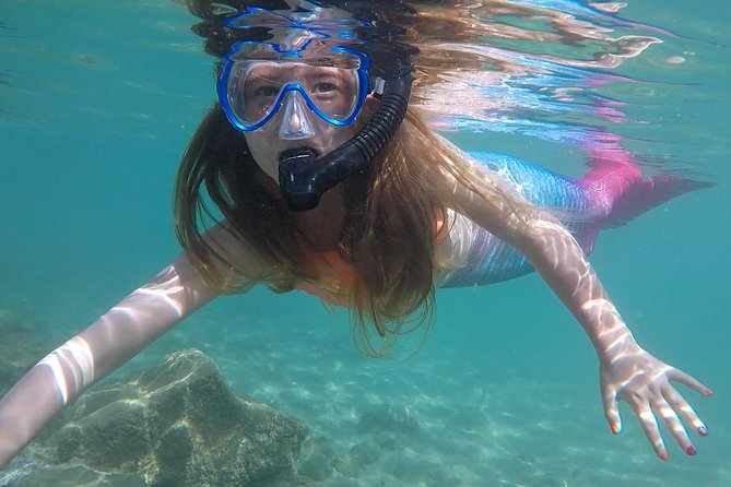 San Juan Mermaid Snorkel Experience with Video Shoot - Learning the mermaid poses before snorkeling