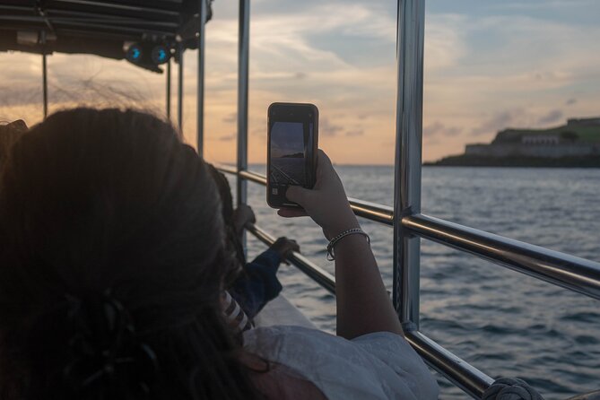 San Juan Sunset Harbor Boat Ride - San Juan’s old walls from the water