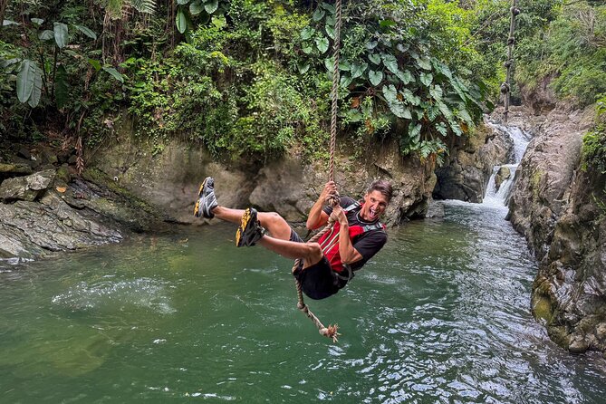 Small Group El Yunque Half Day Tour with Transport: Waterslide - Leaving San Juan in an air-conditioned van