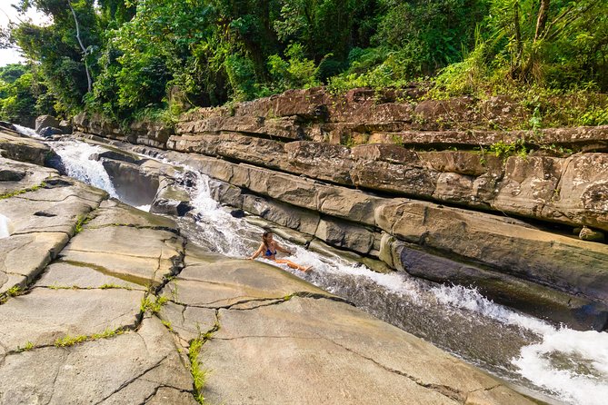 Yunque Rainforest River Rope Swing with Waterslide and Beach Tour - Lunch in Luquillo, with your own restaurant budget