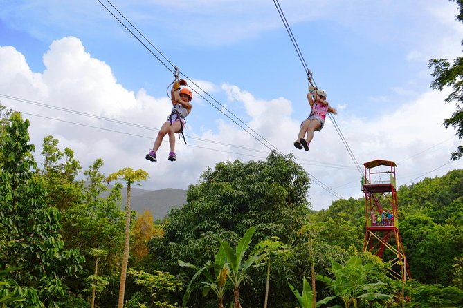 Zipline Canopy Tour with Transport from San Juan - Getting fitted with a harness and helmet